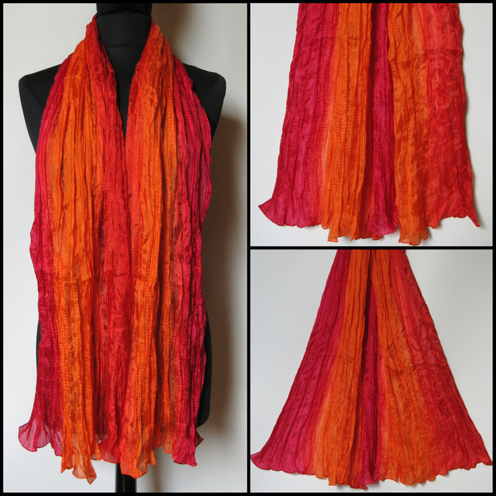 Silketørklæde i røde, orange, cyclame nuancer. Samarkand har stort udvalg af silketørklæder i mange farver.